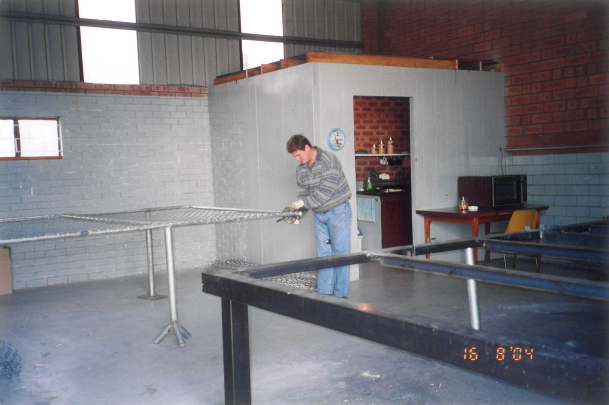 Fabricating a fence panel in the Canning Vale factory, August 2004
