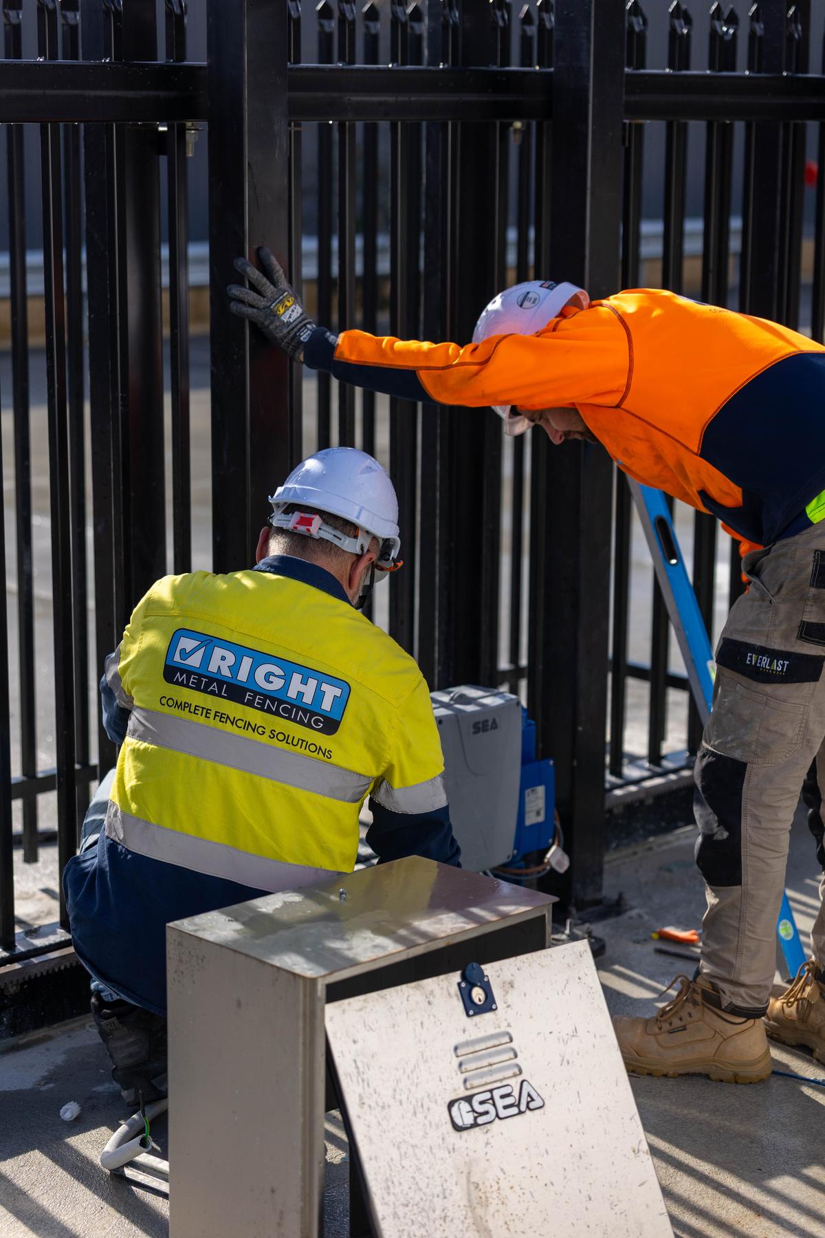 RMF technician servicing a gate motor