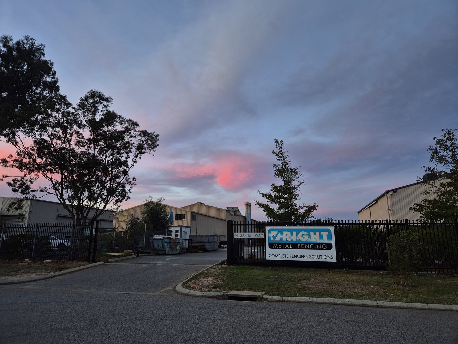 Right Metal Fencing entry at 14 Garnet Way, Maddington, at dusk